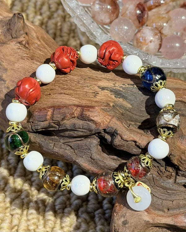 Multicolor Beaded Bracelet with Carved Red Accents