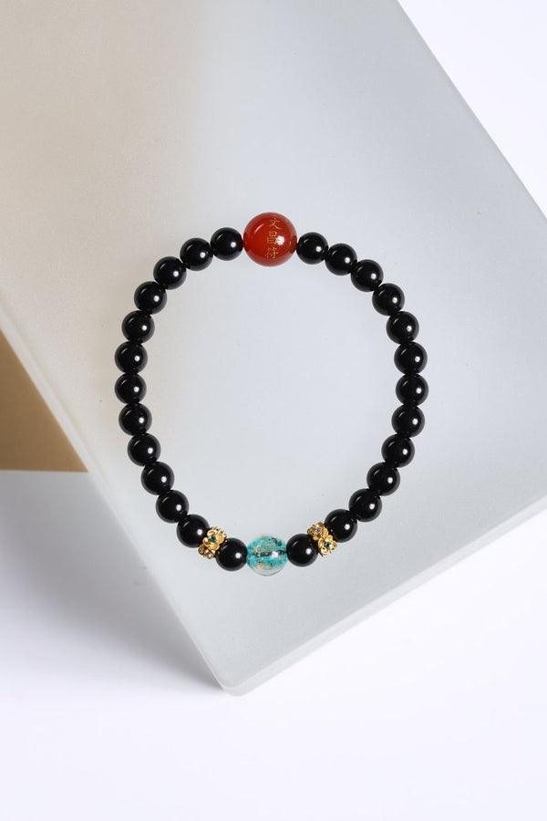 Black Beaded Bracelet with Red & Blue Accents