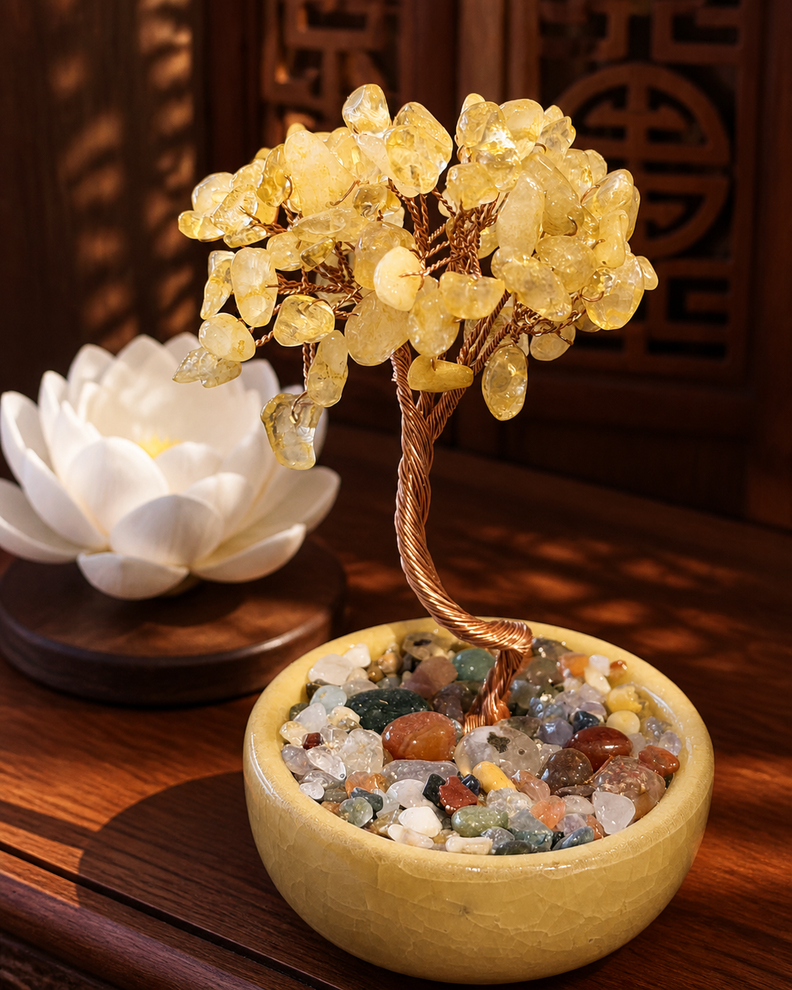 Yellow citrine crystal money tree ornament on a Chinese wood altar