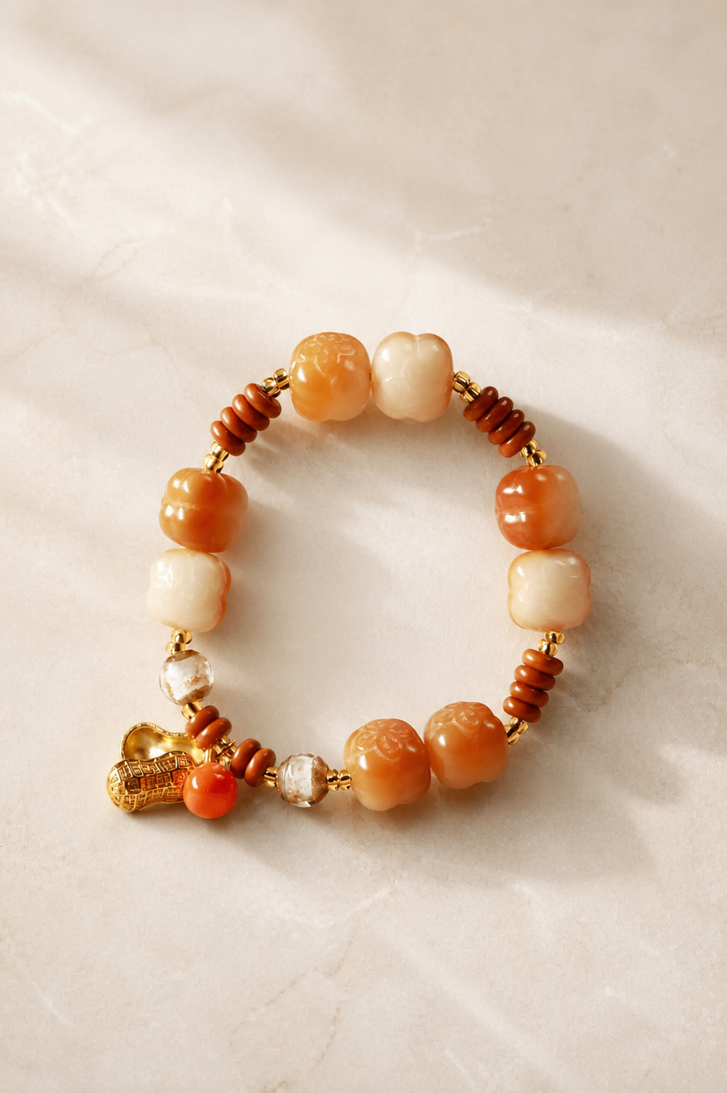 Orange and white beaded bracelet