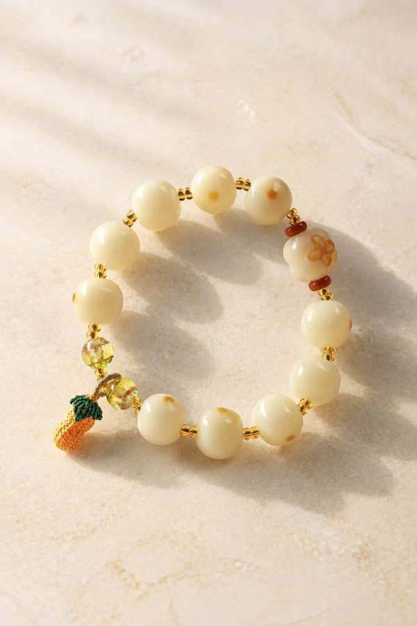 White Jade Beaded Bracelet with Pineapple Charm