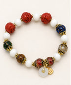 Multicolor Beaded Bracelet with Carved Red Accents — product image 5