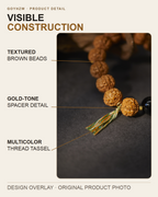 Visible construction of the Vajra Bodhi and Black Agate Bracelet: textured brown beads, gold-tone spacer detail, and multicolor thread tassel.