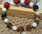 Multicolor Beaded Bracelet with Carved Red Accents — alternate angle