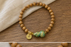 Fortune Wheel green sandalwood gourd bracelet angled view