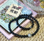 Black Beaded Bracelet with Silver Charms — product detail