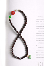 Black Beaded Mala with Red Carved Accent — product image 6
