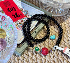 Black Beaded Mala with Red Carved Accent — product image 3