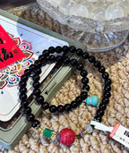 Black Beaded Mala with Red Carved Accent — product image 4