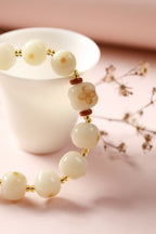White Jade Beaded Bracelet with Pineapple Charm — product image 4