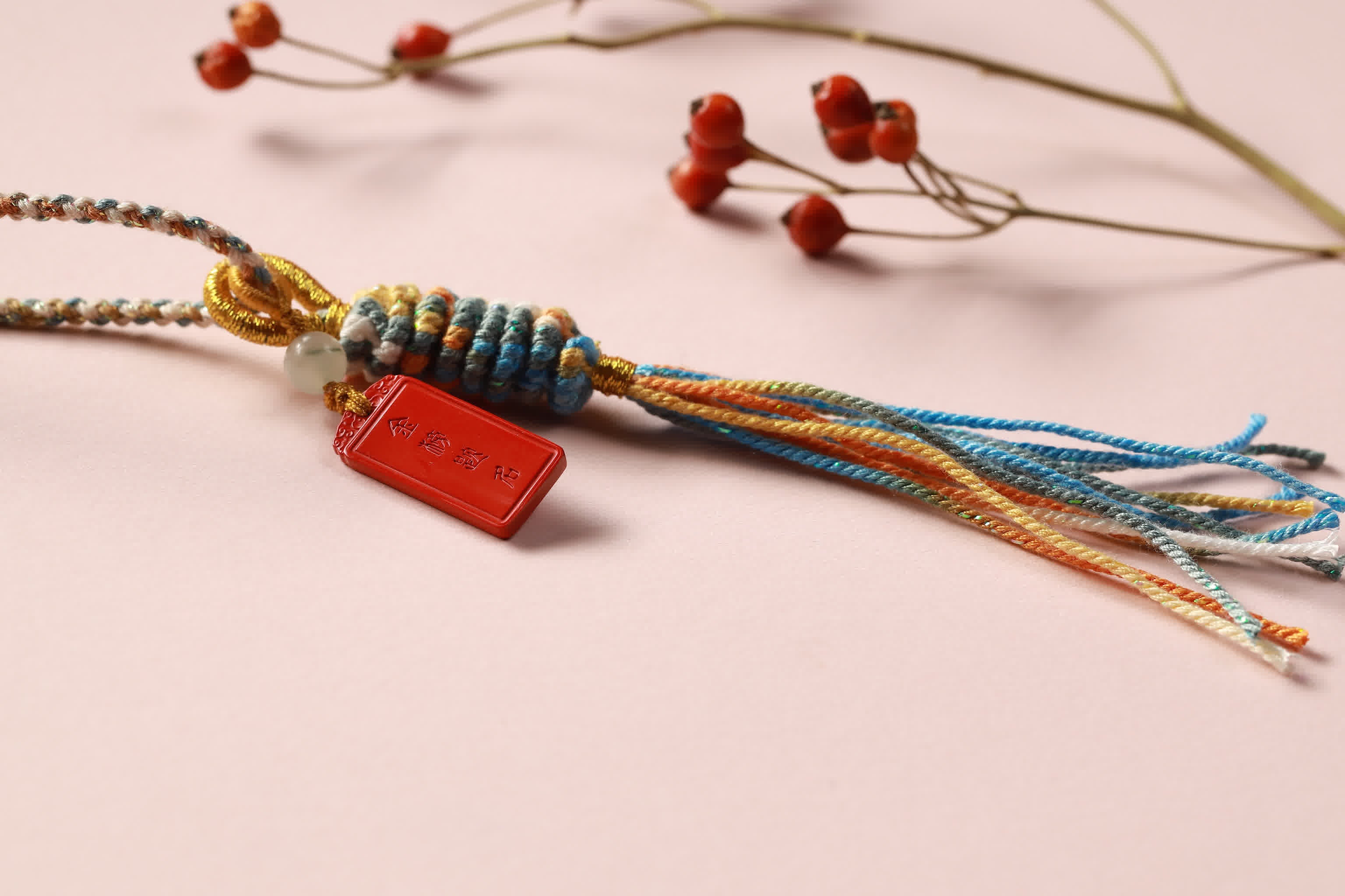 Wisdom & Ascent Cinnabar Prayer Wheel Charm