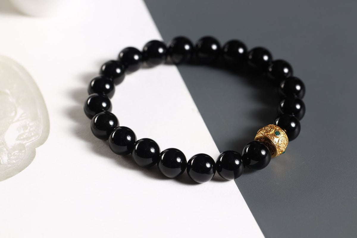 Black Obsidian Beaded Bracelet with Gold Charm — product image 1
