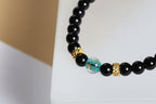 Black Beaded Bracelet with Red & Blue Accents — product image 2