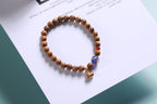 Brown Wood Beaded Bracelet with Blue Accent — product image 2