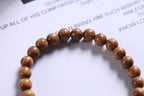 Brown Wood Beaded Bracelet with Blue Accent — product image 4
