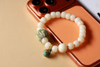 White Beaded Bracelet with Green Woven Accent — product image 1