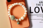 White Beaded Bracelet with Green Woven Accent — product image 6