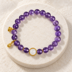 Amethyst bracelet on stone display
