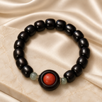 Blackwood beaded bracelet with red center accent - editorial view