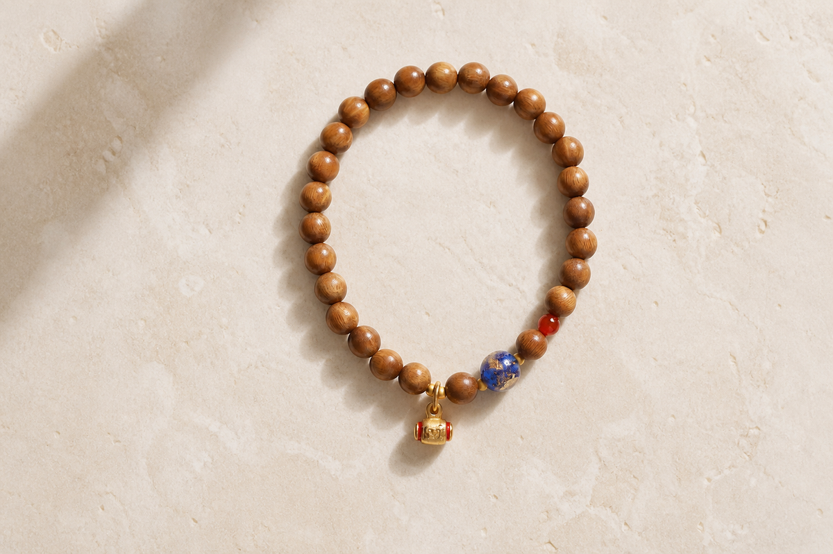 Brown wood beaded bracelet with blue accent