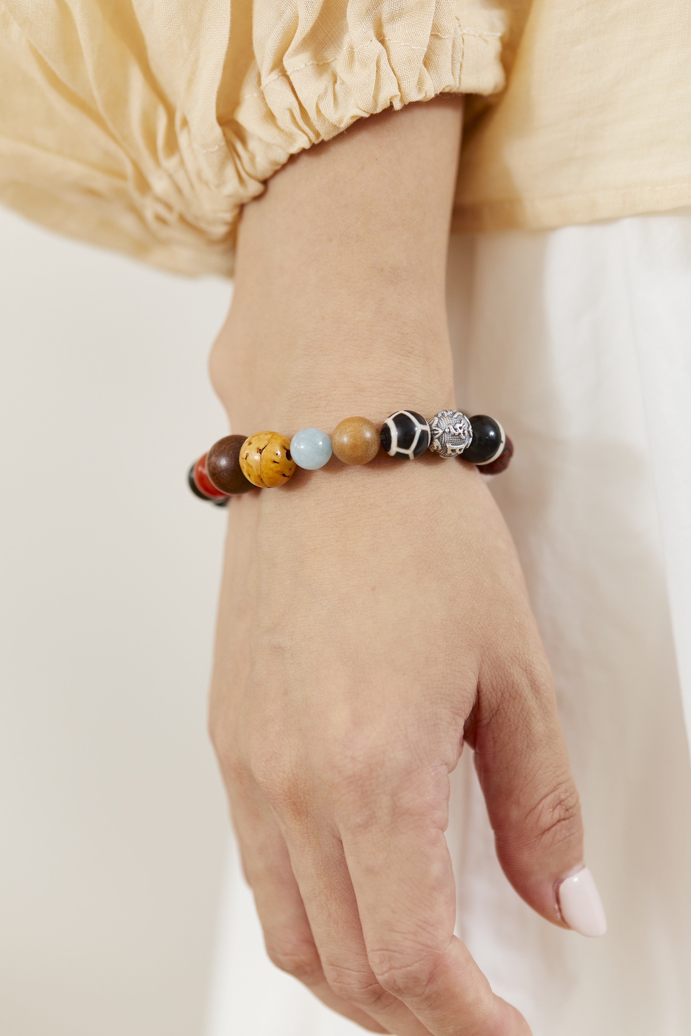 Women's 18-bead zodiac bracelet worn on the wrist