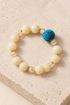 Cream Beaded Bracelet with Blue Accent - product image 1
