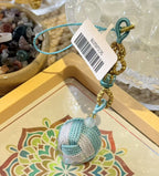 Embroidered Ball cultural ornament - real product photo