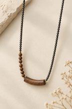 Black Beaded Wood Pendant Necklace - studio image