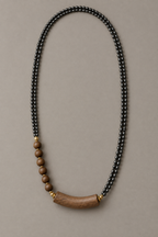 Black Beaded Wood Pendant Necklace - studio image