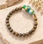 Fortune Wheel Green Sandalwood Gourd Bracelet - product image 1