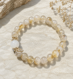 Golden rutile and clear quartz bracelet product photo