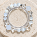 Graceful Path white crystal beaded bracelet on stone display
