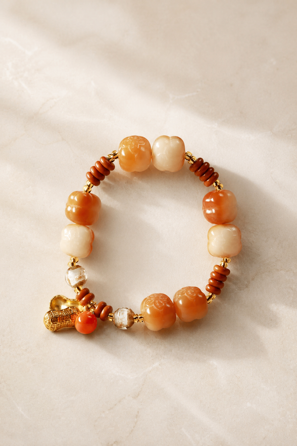 Orange & White Beaded Bracelet with Gold Charm