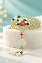 Pale green jade lotus multi-wrap bracelet editorial view