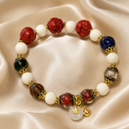 Multicolor Beaded Bracelet with Carved Red Accents