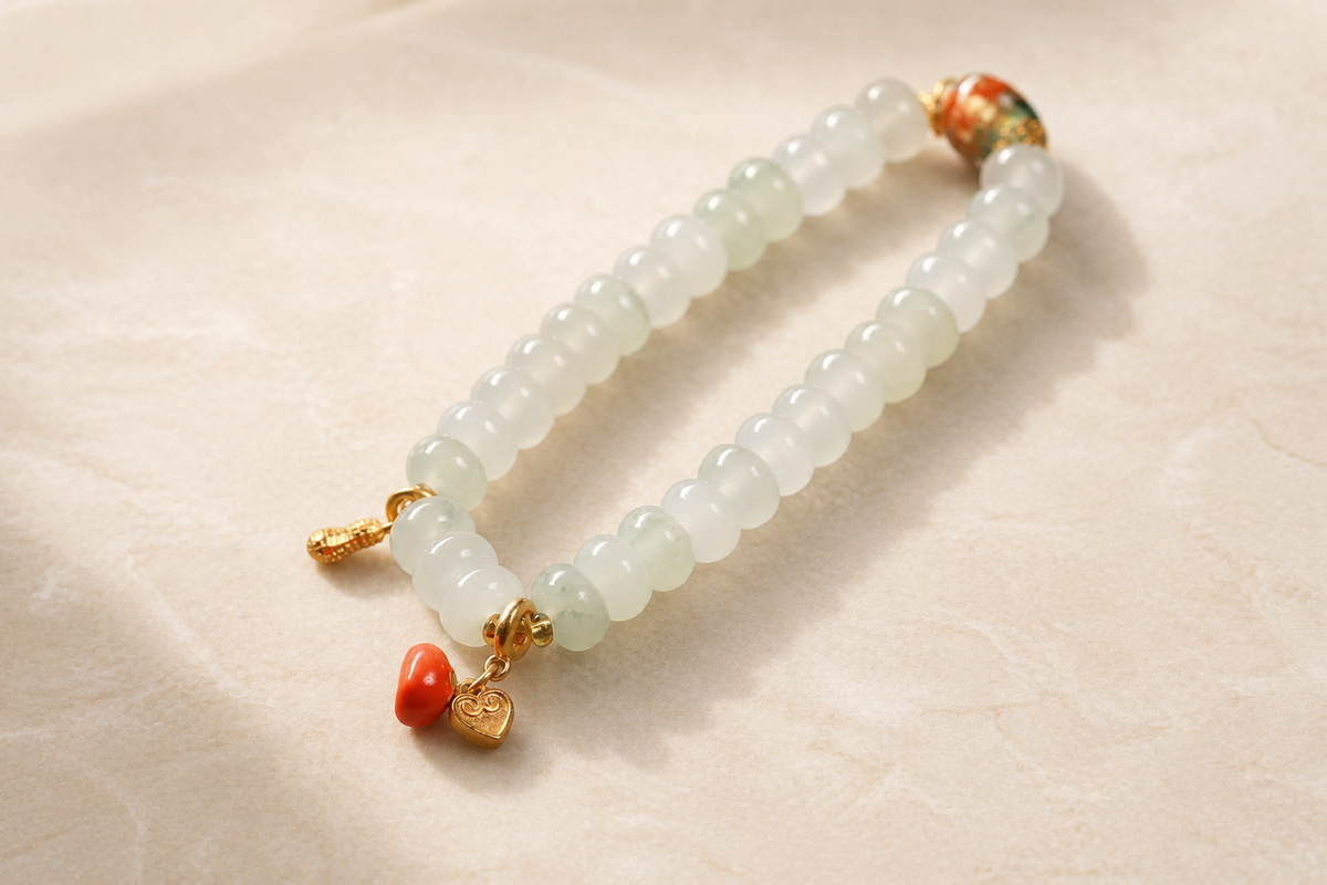 Triple Harmony Green Jade Bamboo Bracelet on ivory stone